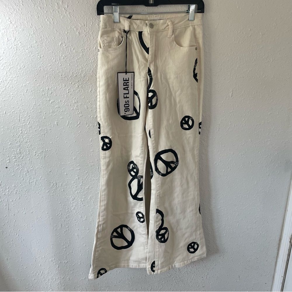 Almost Famous 90’s Flare Peace Sign‎ Print Jeans